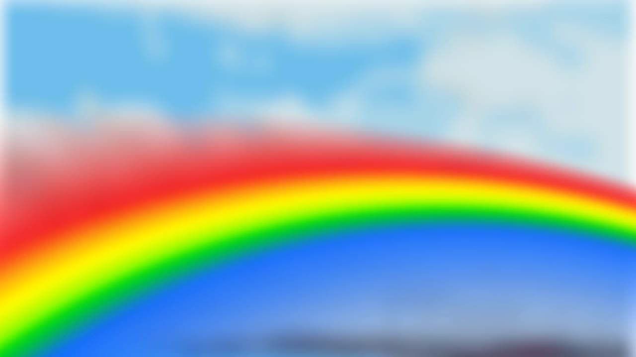 animación del arco iris sobre el cielo nublado