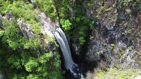 leivaditis waterfall in greece aerial view, surrounded by dense forest in the rhodope mountains. a hidden natural gem near xanthi, perfect for eco-tourism and nature lovers