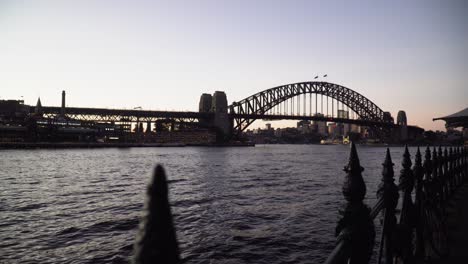 sydney harbour bridge at new south wales, australia during sunset