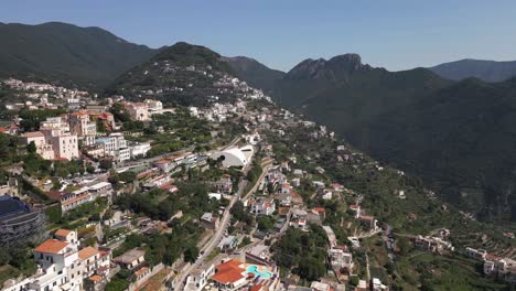 small european town in the mountains of the amalfi coast from an aerial drone's pov