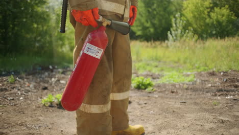 firefighter with fire extinguisher