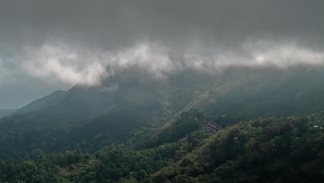 mountains shrouded in dense fog