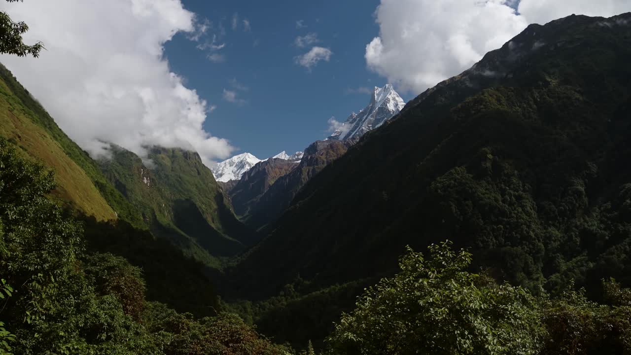 Valley in Himalayas Muntains Foothills with Green Trees Landscape Scenery in Nepal, Annapurna Mountains and Lush Greenery with Snowcapped Top of Fishtail Mountain Summit at Machapuchare
