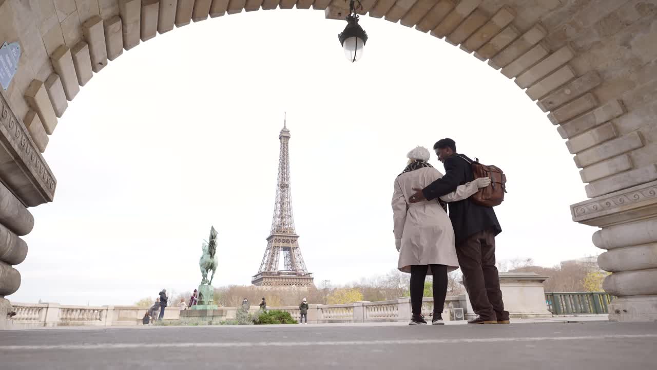 Couple Embracing in Paris with Eiffel Tower in Background