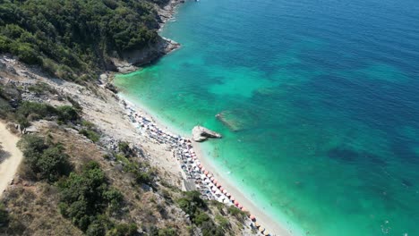 aerial view of a stunning beach with turquoise water