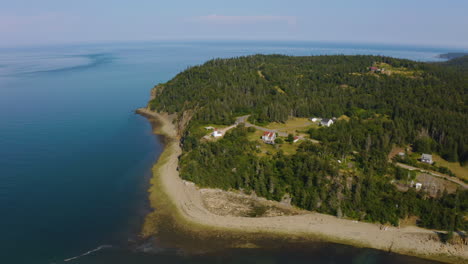 Picturesque-aerial-view-of-homes-perched-along-the-rugged-Atlantic-shoreline-of-Grand-Manan-Island-in-the-Bay-of-Fundy