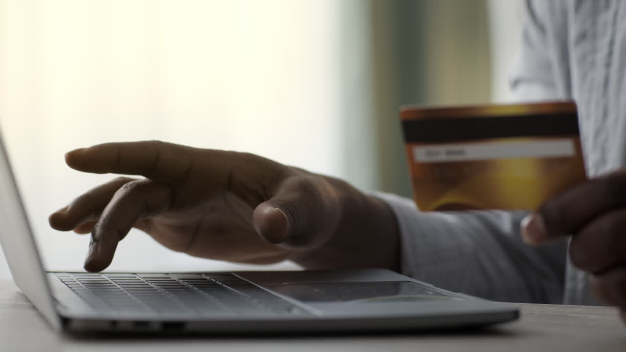 Online Shopping with Laptop and Credit Card