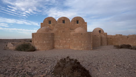 Push-In-Shot-of-UNESCO-World-Heritage-Site-Qasr-Amra-Desert-Castle-with-Three-Domes-and-Bath-Complex