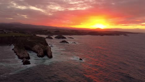 mother earth save the planet concept in an aerial view sunset rock cliff natural formation seascape