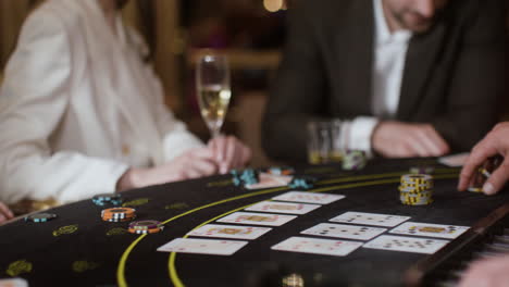 people playing poker at the casino.