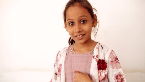 portrait of an indian child at home during coronavirus lockdown