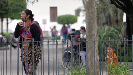 woman with child in guatemalan city park