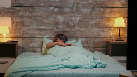 woman in pajamas having a bad sleep