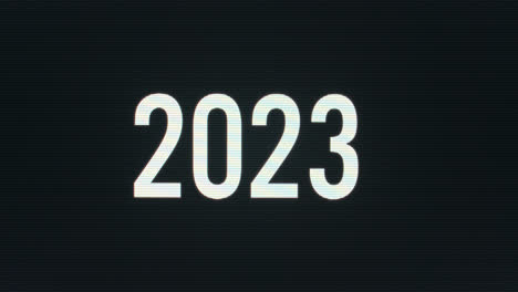 primer plano de 2023 siendo escrito en un monitor de computadora vintage con el cursor parpadeante