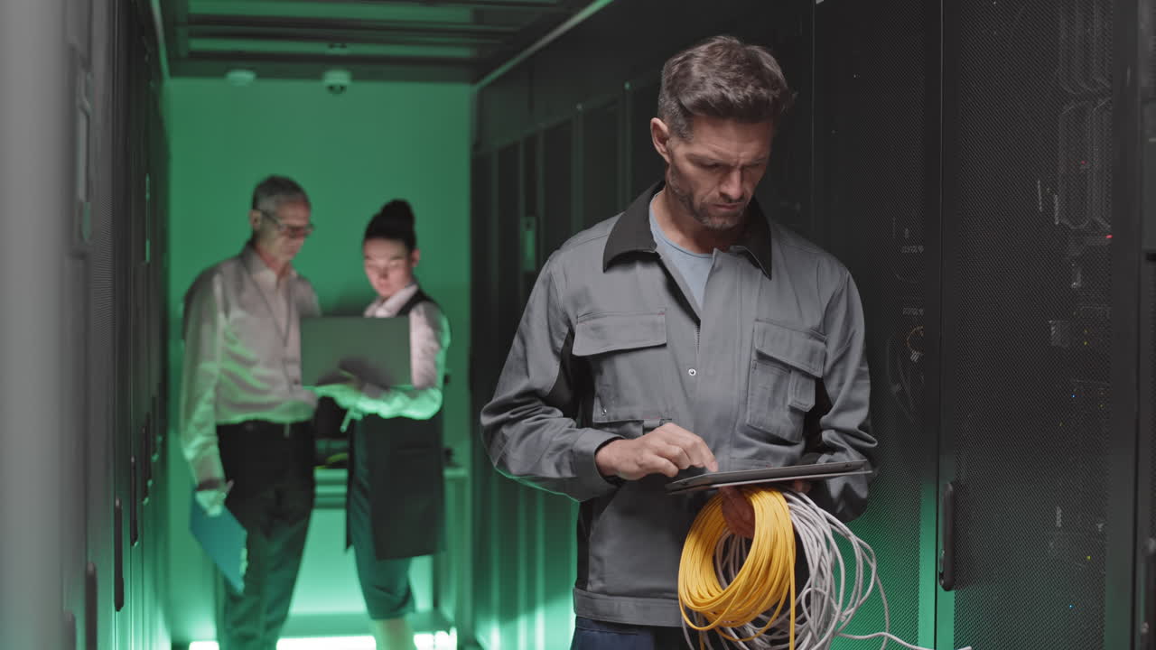 Data Center Technicians Working on Servers