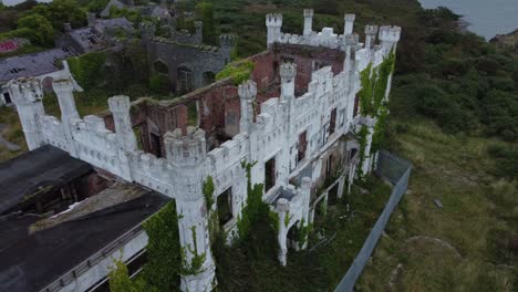 soldiers point house aerial view circling abandoned weathered ruins overgrown castle mansion