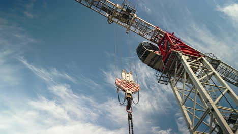 the hook block and cabin of a flat-top construction crane