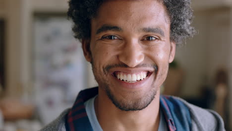 portrait happy mixed race man smiling enjoying successful lifestyle healthy man at home looking confident