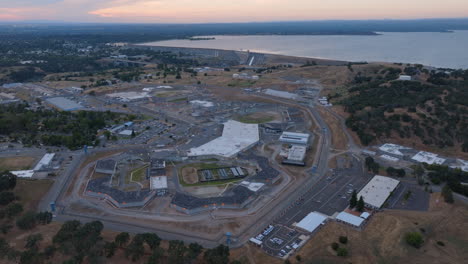 Aerial-Drone-View-of-Folsom-Prison-and-Folsom-Lake-during-sunset