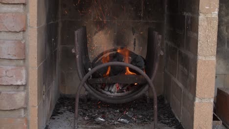 4k at 24fps - burning coal on a rusty grill on a sunny day - relax and warm mood