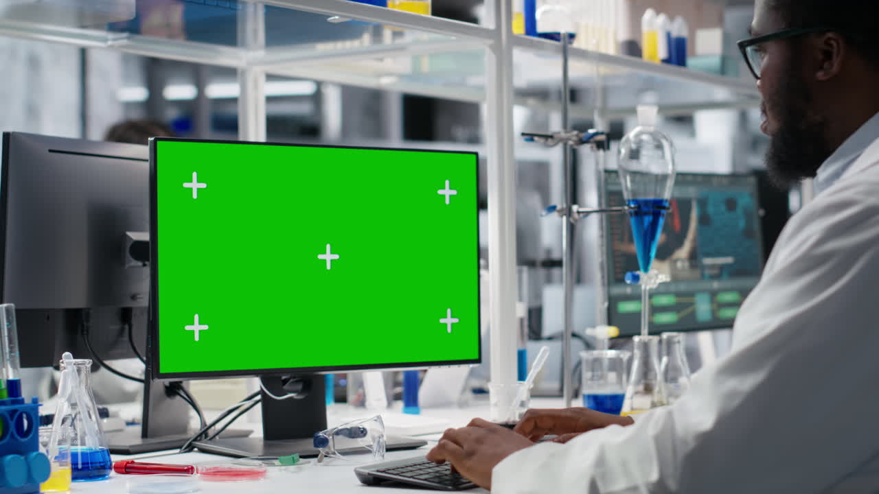 Lab Engineer At Desk Typing On Isolated Screen Pc Keyboard