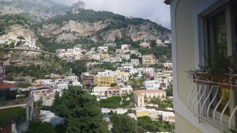 grand view of positano amalfi coast from balcony | near scenic mountain cliffside in positano italy in summer, 4k