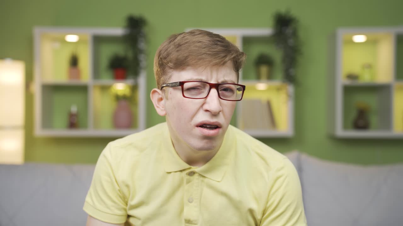 Close-up portrait of listener young man.