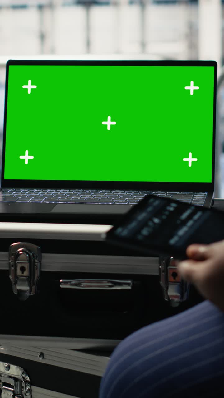 Vertical Video Close Up Of Data Center Employees Check Ai Dashboard Using Green Screen Tablet