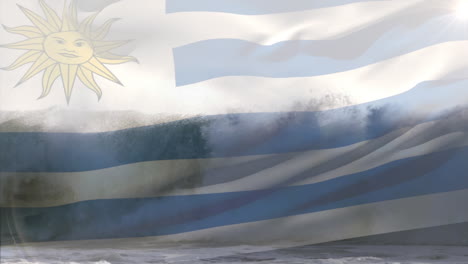 digital composition of waving uruguay flag against waves in the sea