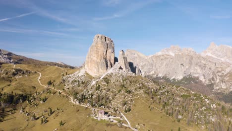 cinematic establishing shot of cinque torri mountains in italy