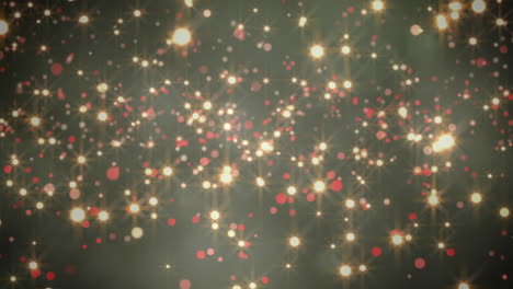 animación de manchas de navidad brillantes que caen sobre un fondo verde