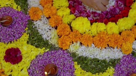 athapookkalam decorating for onam festival in kerala ,pookalam decorating kerala traditional family for onam celebration