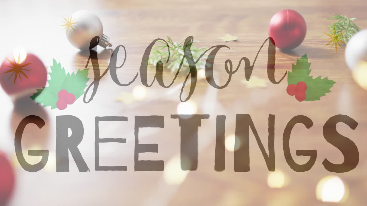 Season greetings text animation over Christmas decorations on wooden background