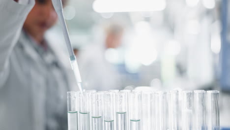 laboratory research with test tubes and pipette