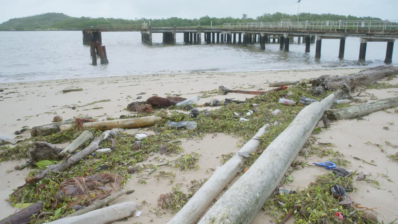 Aftermath of cyclone weather monsoon conditions in remote Cape York. Rubbish and debris washed up on the coastline. Clip 6