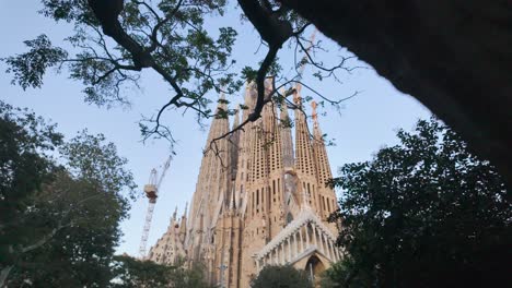 iconic la sagrada familia in barcelona, spain, designed by antoni gaudí, with intricate spires and details