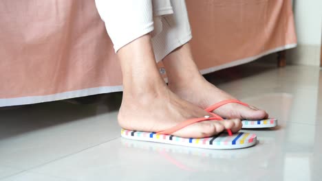 Close-up-of-girls-feet-wearing-sandal-indoor