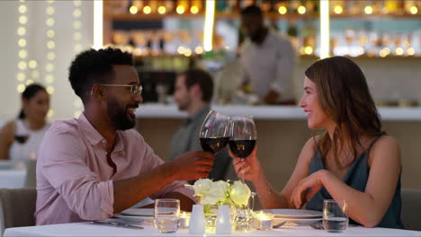 an affectionate young couple making a toast