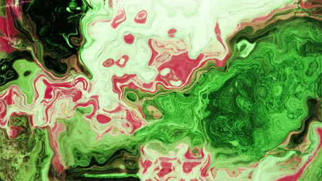 animation of vibrant coloured green and red liquid flowing in hypnotic motion