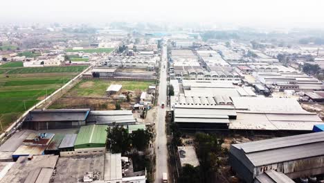 A-typical-industrial-area-in-Pakistan-with-workers-and-commuters-going-about-their-morning-business