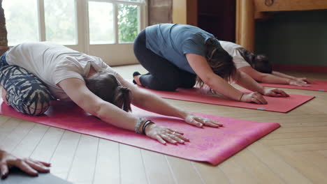 people doing child's pose yoga