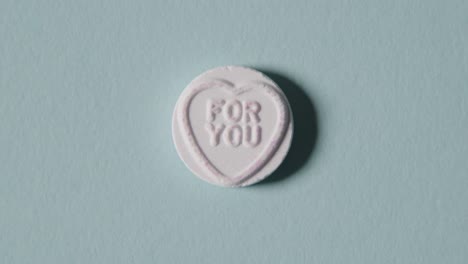 Heart-Candy-With-For-You-Message-On-Blue-Background