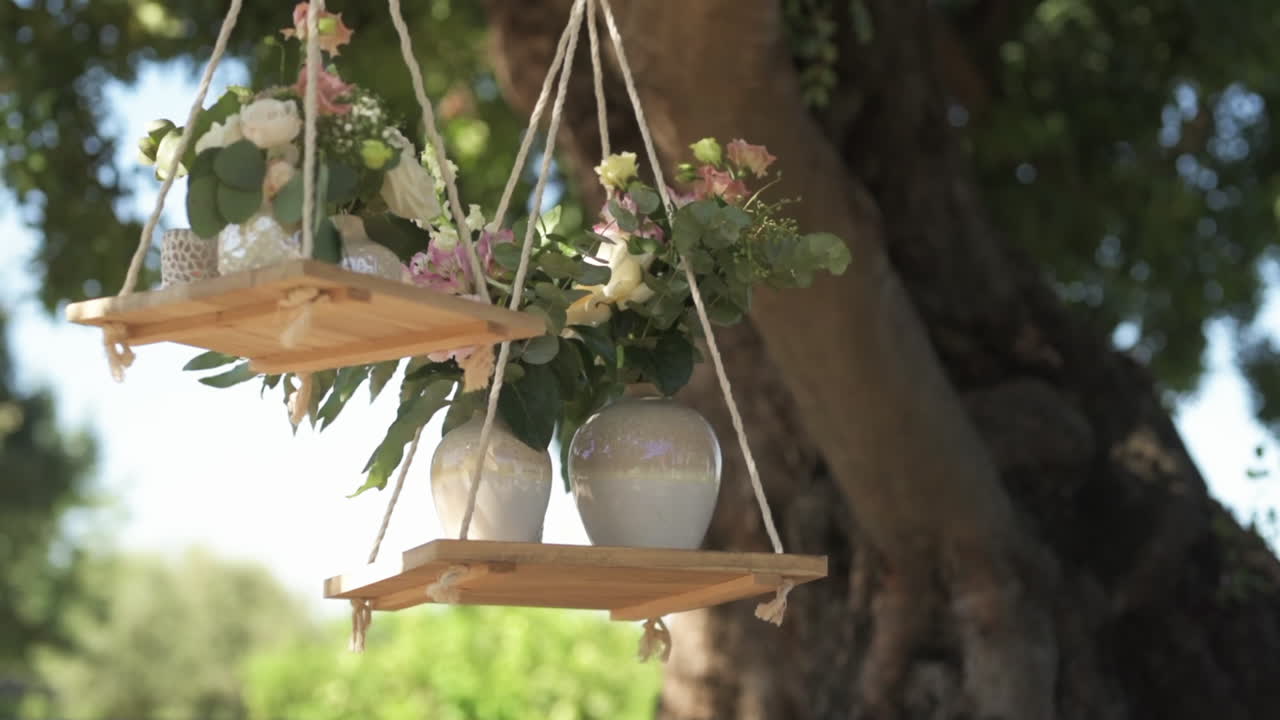Static shot of external wedding decoration and woman passing by
