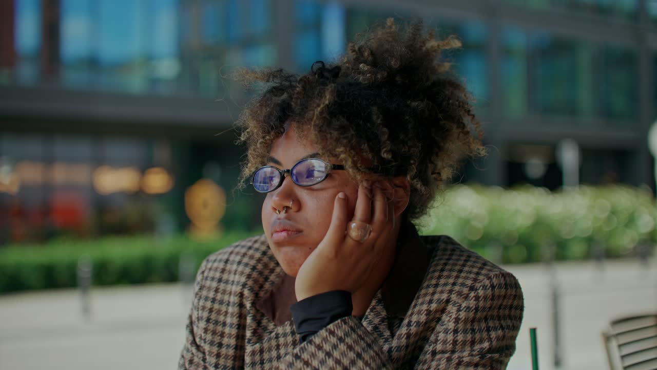 Woman in Plaid Jacket