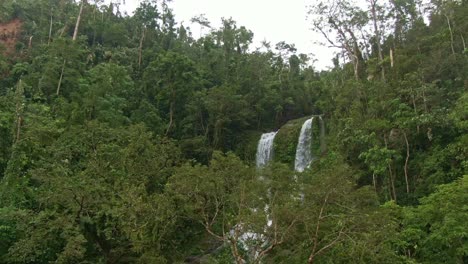 Drone-view-of-the-two-section-falls-of-water-falling-from-above-the-mountain