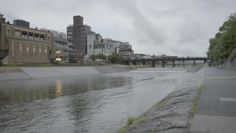 sanjo district and kamo river, kyoto japan on cloudy day