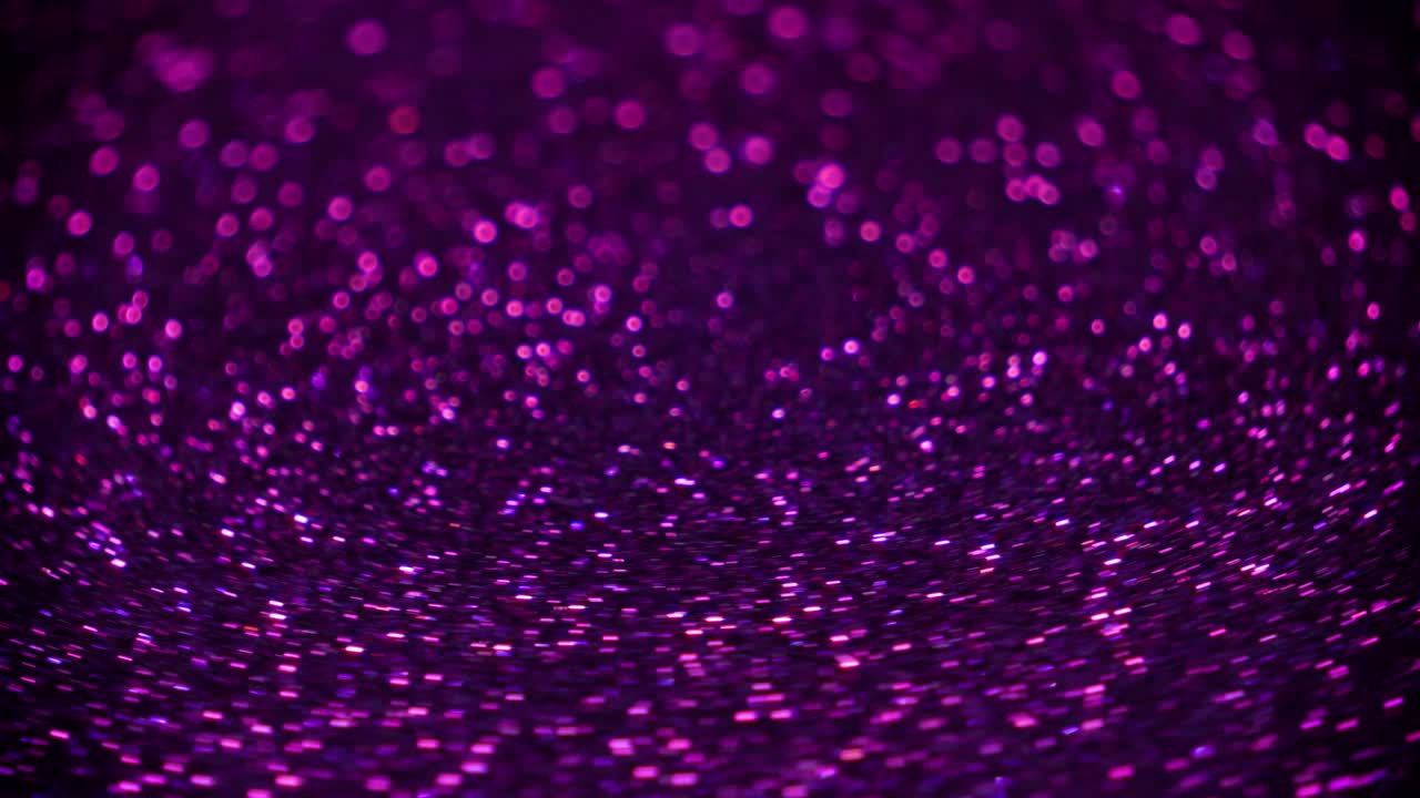 Fast Rotating Flickering Purple Glitter Particles