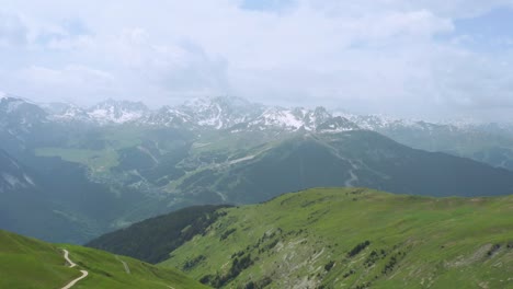 Flyover-shot-of-the-French-Alps-near-Chamonix-Mont-Blanc-on-an-overcast-day