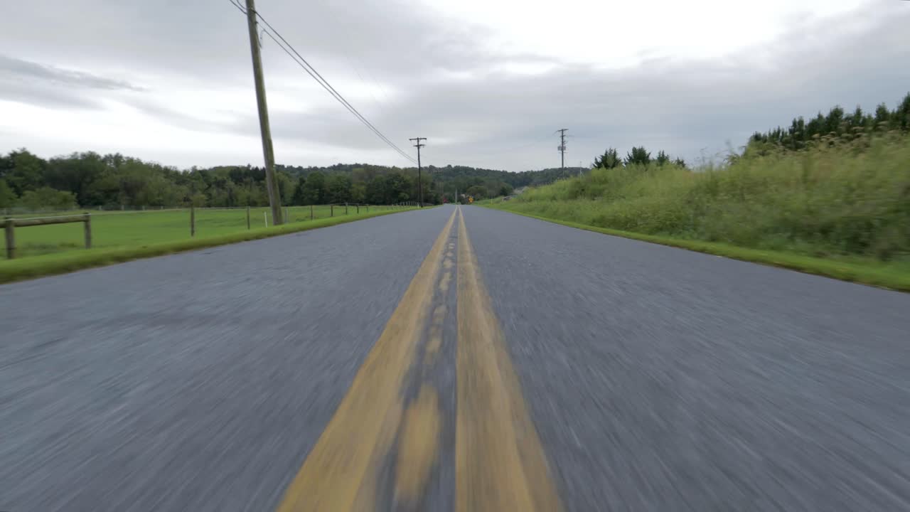 4k close-up camera truck out of a rural road in Eastern Pennsylvania.