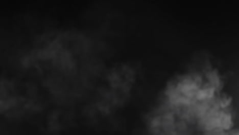 Smoke-cloud.-Smoky-background.-White-steam-over-black-background.